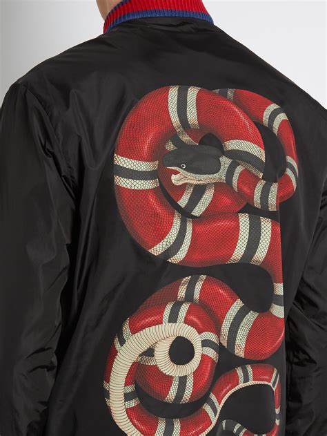 fake vs real gucci snake windbreaker